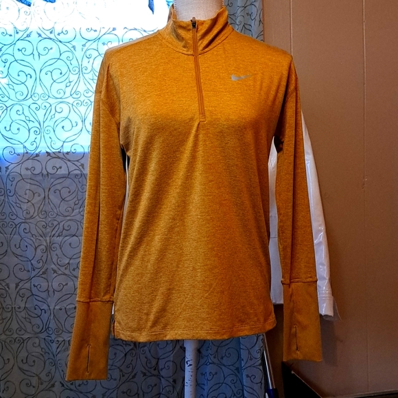 GO FOR THE GOLD!!!Nike dry fit top with thumb holes - Picture 1 of 3